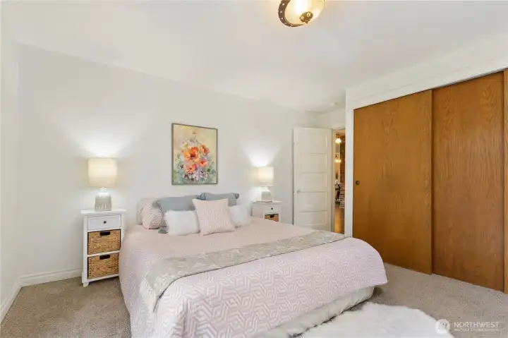 Main floor bedroom showing large wall closet