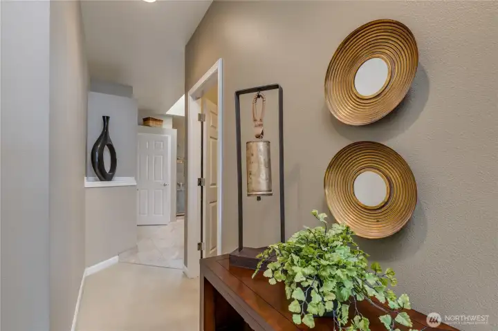 Primary suite includes walk-in closet and 3/4 bathroom