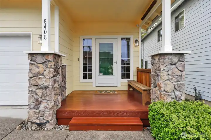 Large covered front porch offering a warm, inviting entry that sets the tone for the home.