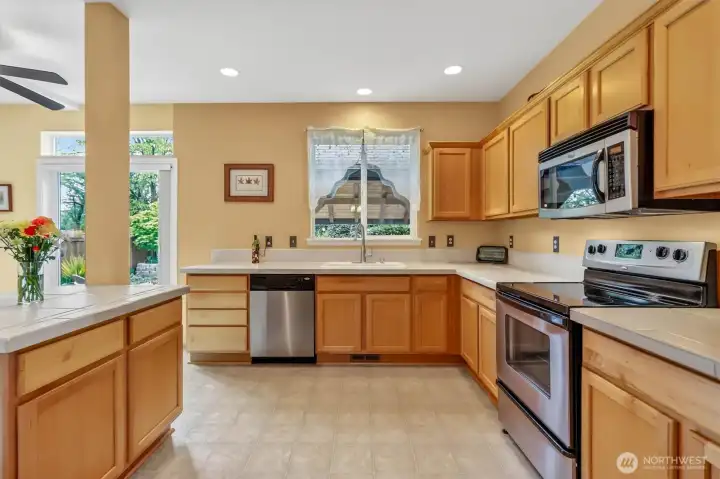 The kitchen is spacious with lots of storage space.