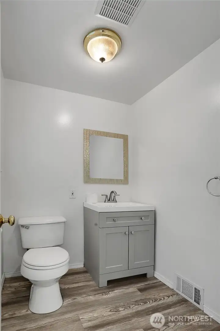 Half bathroom off kitchen on main level