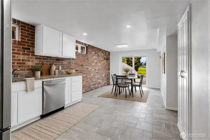 Virtually Staged Kitchen with eating space on lower level. Fresh paint, all appliances stay!