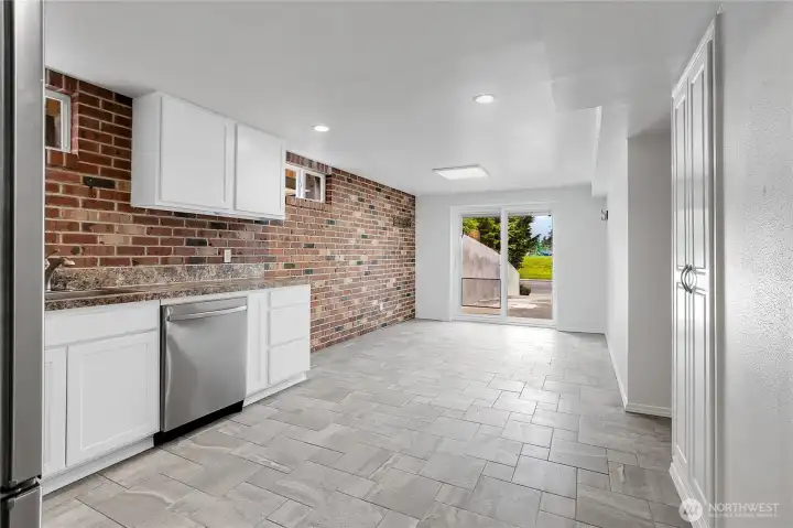 Kitchen with eating space on lower level. Fresh paint, all appliances stay!