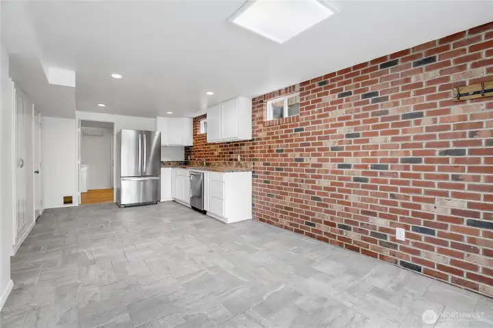 Kitchen with eating space on lower level. Fresh paint, all appliances stay!