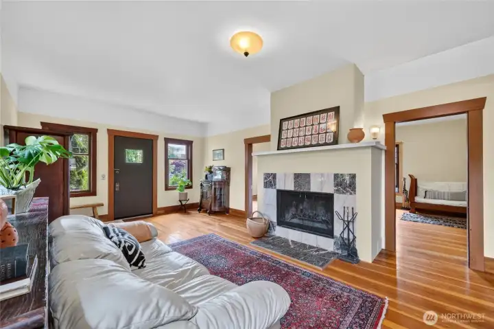 Cozy wood firing fireplace anchors the living room Cozy wood firing fireplace anchors the living room