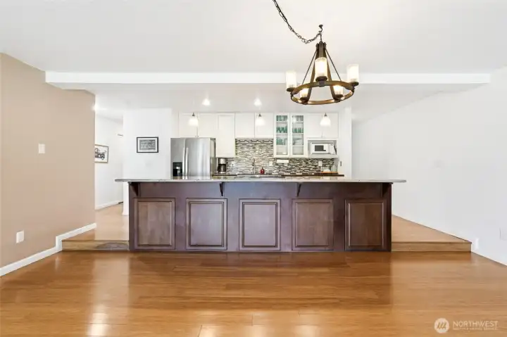 Oversized island central to the living space makes entertaining a dream!