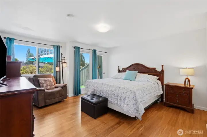 Primary Bedroom with access to the private back patio.