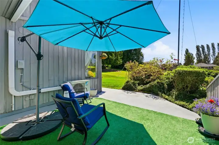 Enjoy the sun in private from this patio off of the primary bedroom.