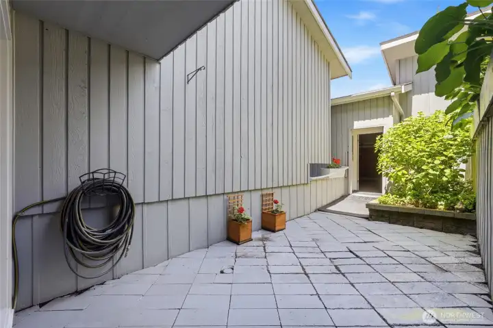 Front patio space with access to the garage.