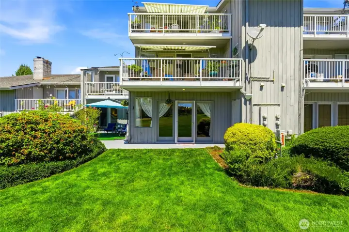 Patio space off of the main living area that puts you eye level with the tee box for some fun summer entertainment.