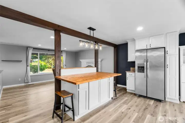 Exposed beams and butcher block island bring new style to this home! Exposed beams and butcher block island bring new style to this home!