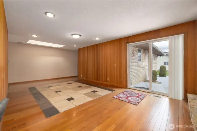 Dining Room/Flex Room with gas fireplace and slider to back patio