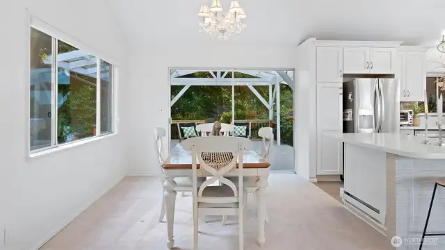 Everything feels fresh and new here! The carpet (installed in 2023) was just professionally cleaned. The 8-foot sliding door leading to an incredible covered deck - your BBQ and entertaining headquarters!