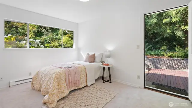 More Airbnb potential? Yet another upstairs bedroom with its own private entrance! It's a perfect bedroom retreat, a haven to recharge and relax.