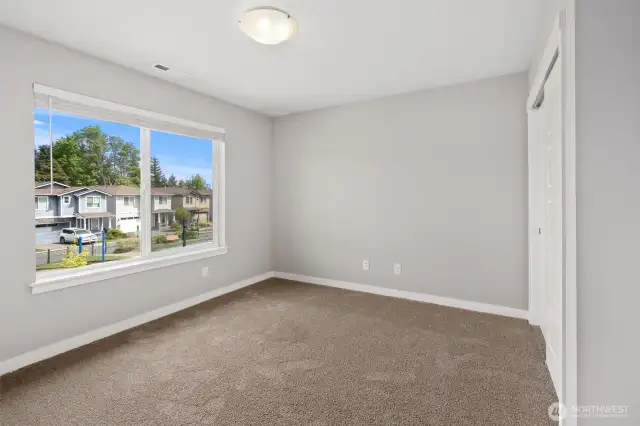 Guest bedroom with large closet.