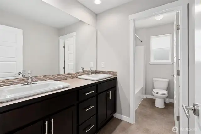 Second floor, main bath, conveniently located across the hall from guest bedrooms, next the laundry/linen room.