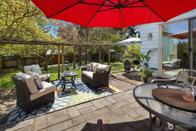 A true backyard sanctuary, combining entertainment space with room for flourishing gardens