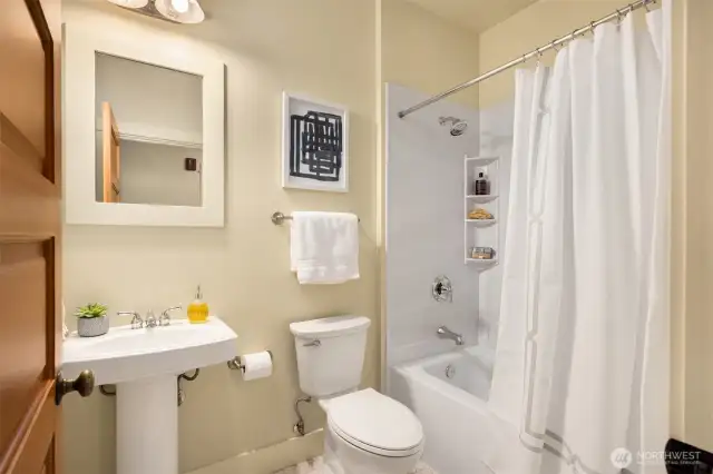 Hall bathroom includes new tub/shower and new toilet.