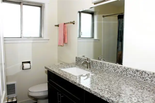 Full bathroom with lots of counterspace!