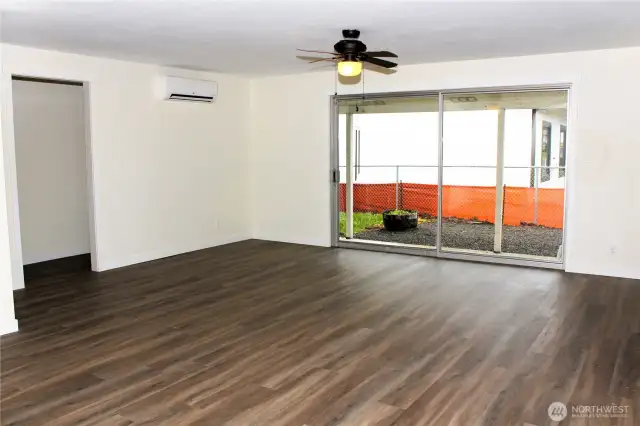 Another view of the spacious living room, looking into the backyard.