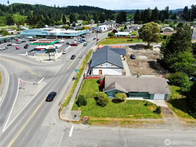 Aerial view showing full service grocery store and gas station just across the street!
