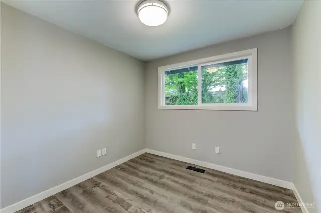 third Bedroom. Perfectly suited for use as a guest room, nursery, or productive home office.