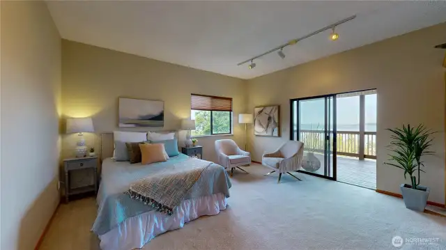 Bright and spacious second bedroom suite with balcony and Puget Sound views.