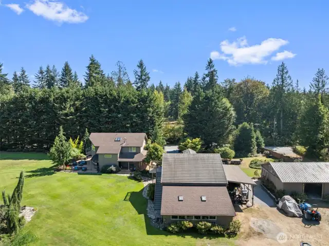 Home, garage/shop, large bonus room and barn