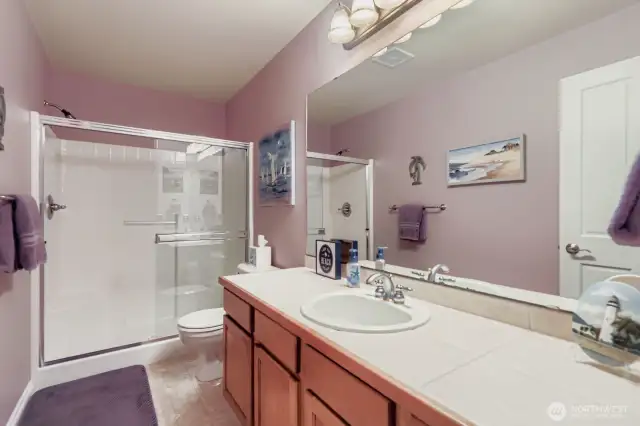 MAIN FLOOR BATHROOM W/ SHOWER IS PERFECT FOR GUESTS AND NEXT TO DOWNSTAIRS BEDROOM #5.
