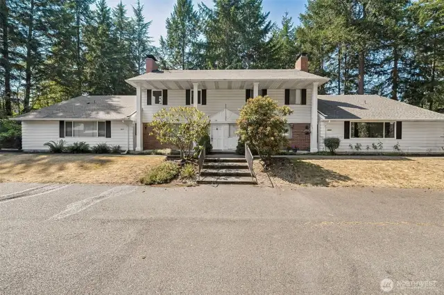Building is private and secluded off of 97th.  There are 4 homes to each building.  Home is on the right, one level end unit.
