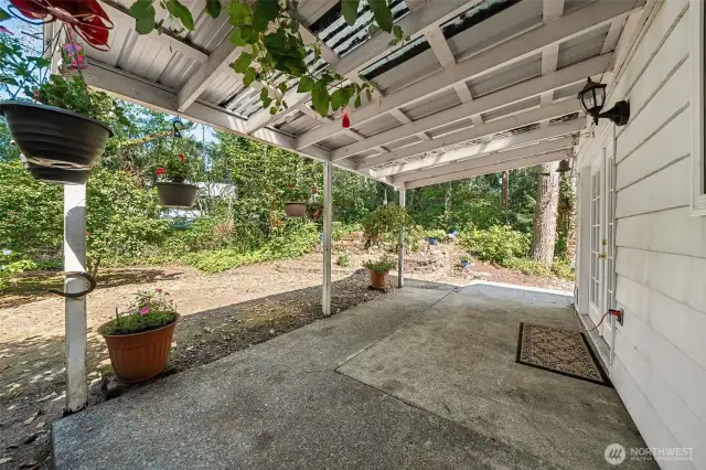 Another view of the space.  Yard is maintained by the HOA but homeowner has an opportunity to get creative with  potted garden.