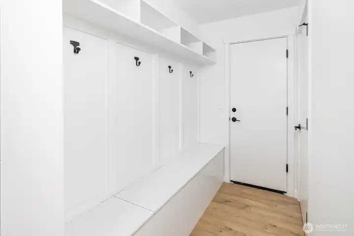 Another amazing and functional built in feature from this quality builder!  A mud room with lots of built in storage just off of the secure garage entrance.