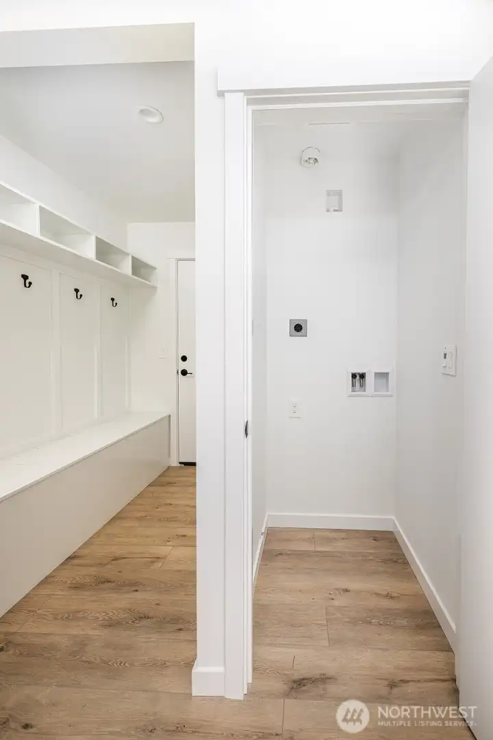 Main floor washer and dryer hook up designed for full size stackable units.