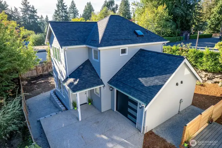 Another view of this sweet, and private stand alone!  Feel free to discuss further fencing options.  EV charger ready in garage!