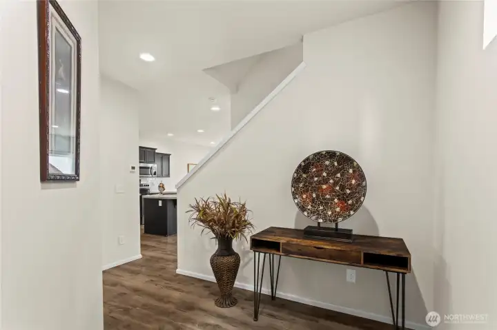 Elegant entry show casing cathedral ceilings