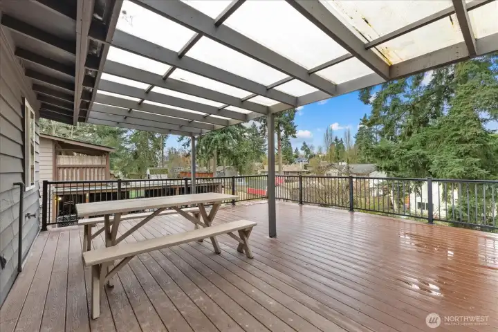 Access to rooftop deck right off the kitchen. Covered for year round enjoyment.