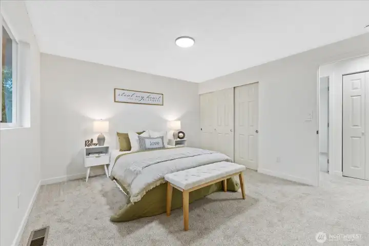 Primary bedroom main floor. Fresh Paint, new doors, new carpet.