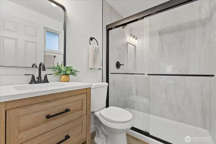 The primary bath was completely remodeled with beautiful finishes.
