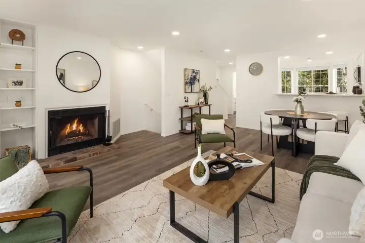 Warm and inviting great room with cozy wood burning fireplace