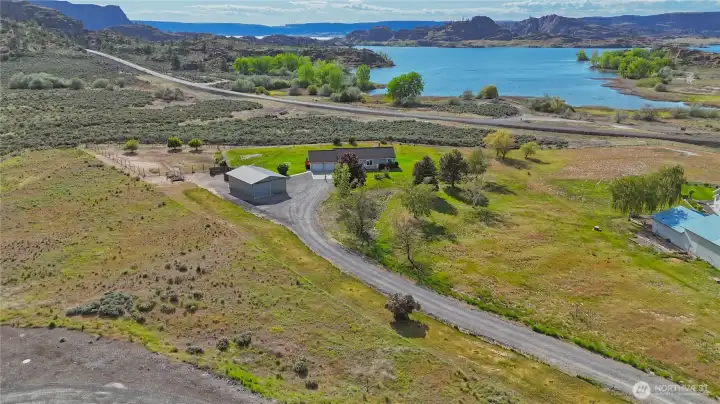 Set on 3.33 acres fenced on two sides, the property offers versatile use options with adjoining BLM land providing direct access to exploration and recreation.