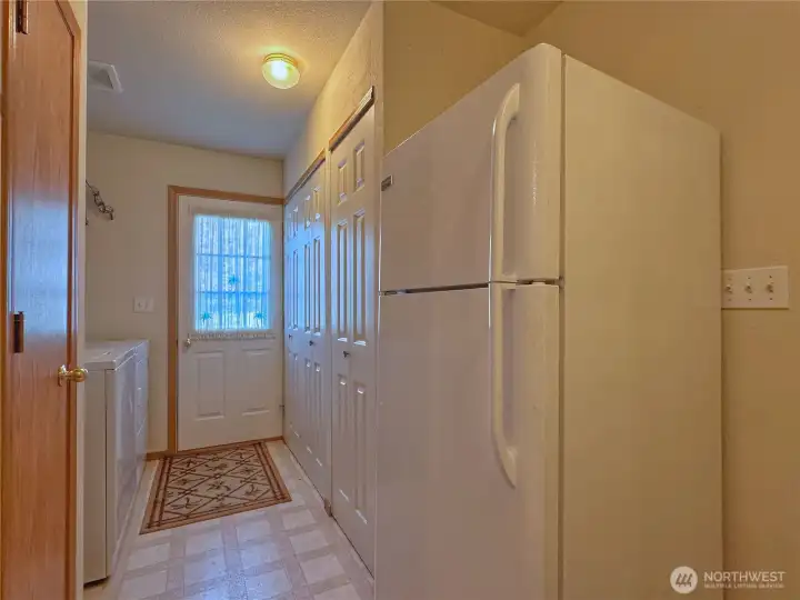 Utilities (hot water tank & HVAC) in one convenient location with mudroom entry from garage/back door