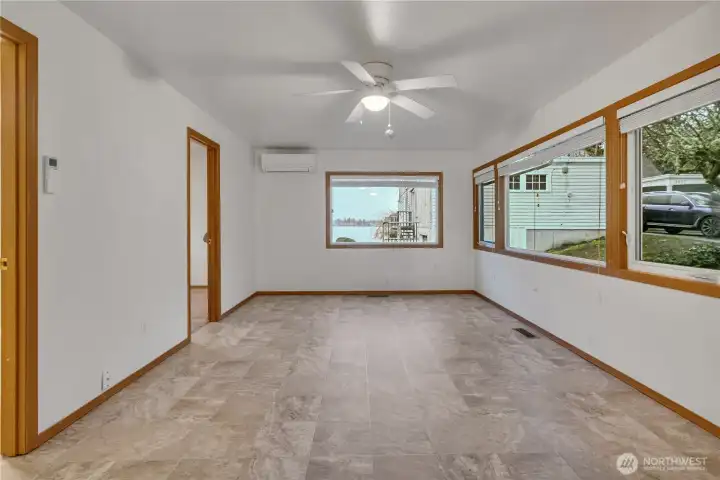 Unit D... Living room with views of American Lake out of the straight ahead window.