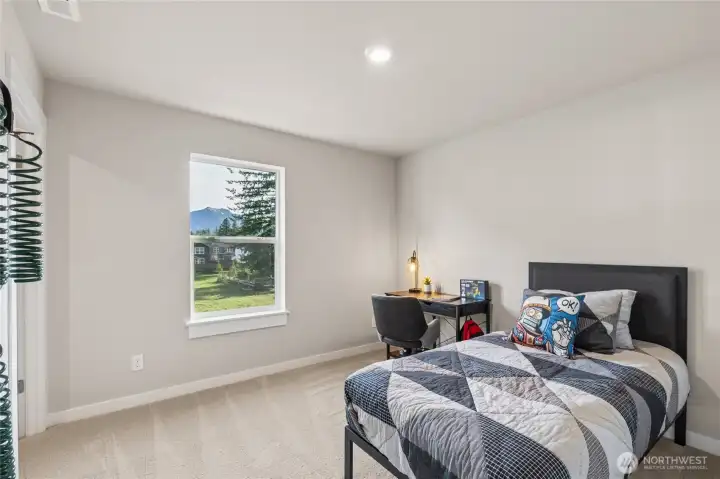 Bedroom 3 with walk in closet. Photo rendering is representational and may be virtually staged. Actual home is under construction and finishes, elevation, and paint colors may vary. See site agent for details. Bedroom 3 with walk in closet. Photo rendering is representational and may be virtually staged. Actual home is under construction and finishes, elevation, and paint colors may vary. See site agent for details.