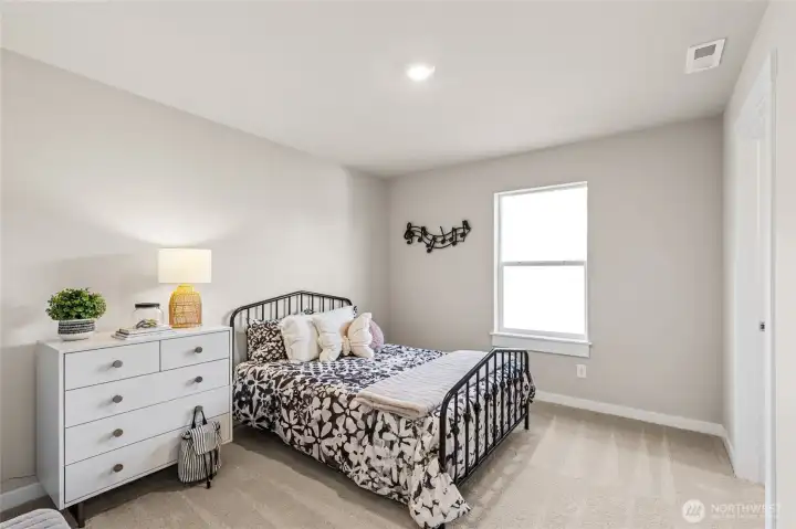 Bedroom 4 with walk in closet. Photo rendering is representational and may be virtually staged. Actual home is under construction and finishes, elevation, and paint colors may vary. See site agent for details. Bedroom 4 with walk in closet. Photo rendering is representational and may be virtually staged. Actual home is under construction and finishes, elevation, and paint colors may vary. See site agent for details.