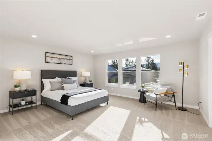 Primary bedroom. Photo rendering is representational and may be virtually staged. Actual home is under construction and finishes, elevation, and paint colors may vary. See site agent for details. Primary bedroom. Photo rendering is representational and may be virtually staged. Actual home is under construction and finishes, elevation, and paint colors may vary. See site agent for details.