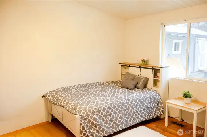 Primary bedroom with attached bathroom. Primary bedroom with attached bathroom.
