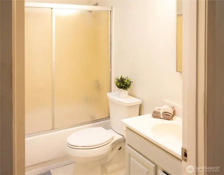 Shared bathroom with bathtub and shower. Shared bathroom with bathtub and shower.