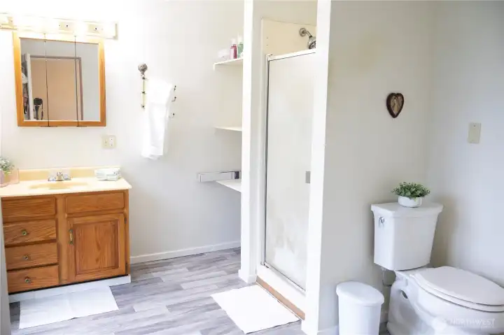 Primary bathroom. sliding glass door to outside for easy access to pool. no need to walk through the house to rinse off after using the pool. Primary bathroom. sliding glass door to outside for easy access to pool. no need to walk through the house to rinse off after using the pool.