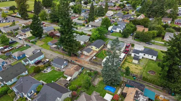 erial neighborhood view showcasing the property's location within an established Enumclaw community close to schools, parks, shopping, and downtown amenities. erial neighborhood view showcasing the property's location within an established Enumclaw community close to schools, parks, shopping, and downtown amenities.