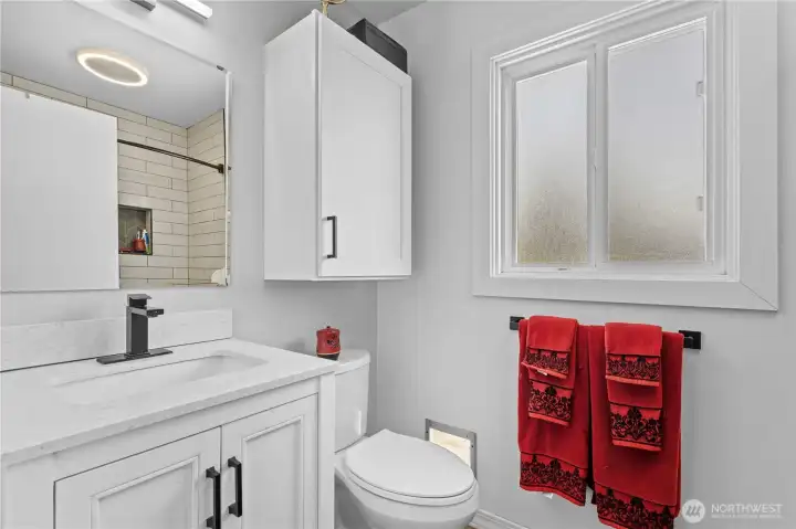 Main level has a full bathroom with small dog/cat door accessing the backyard.